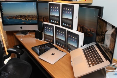 Office desk with imac, iphone and lots of ipads 